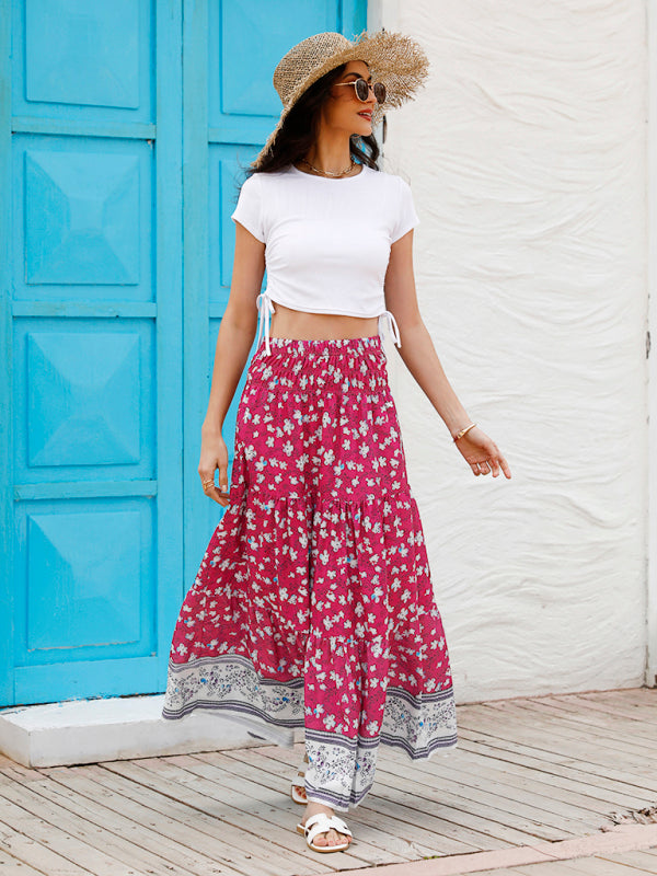 Full-length image of a red floral tiered skirt, perfect for summer outings.
