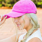 Hot pink CC terry cloth baseball hat with soft texture
