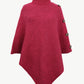 Front view of hot pink turtleneck buttoned poncho in ribbed knit.
