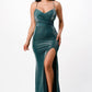 Front view of a hunter green mermaid gown with a side slit and spaghetti straps.
