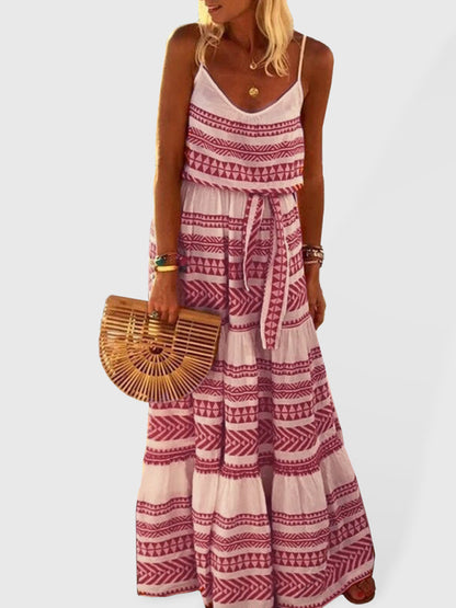 Elegant bohemian maxi dress with intricate tribal print, designed for a relaxed yet stylish look.