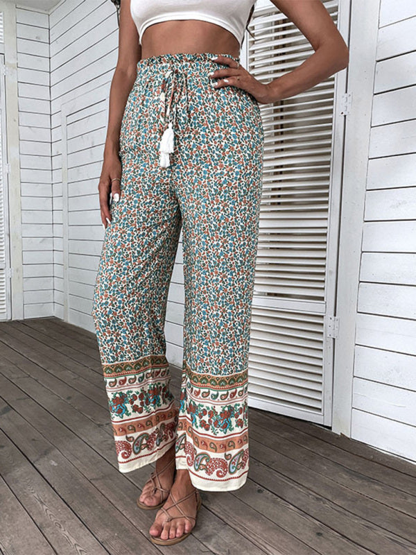 Boho chic wide-leg pants in a colorful floral and paisley print, ideal for casual outings