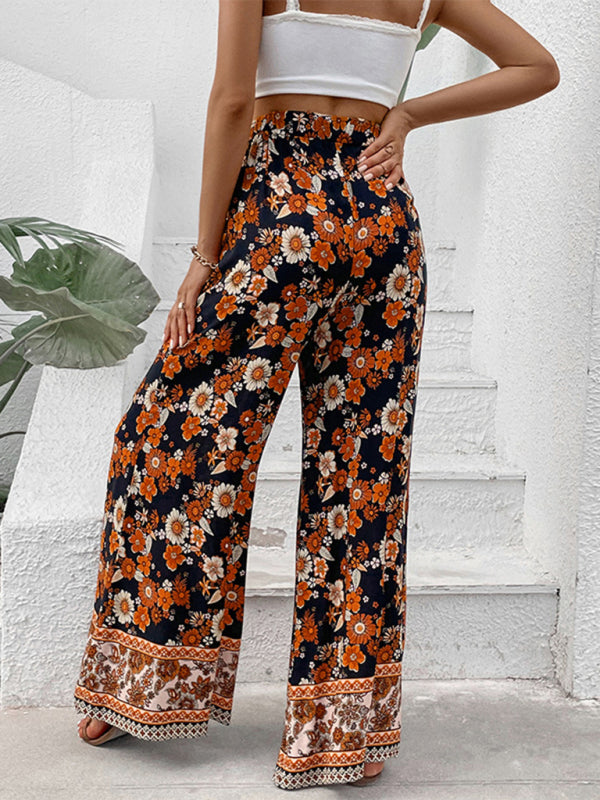 Breathable bohemian floral wide-leg pants for a relaxed summer look.