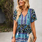 Vibrant blue and black floral peplum blouse with white tassels, perfect for festivals.