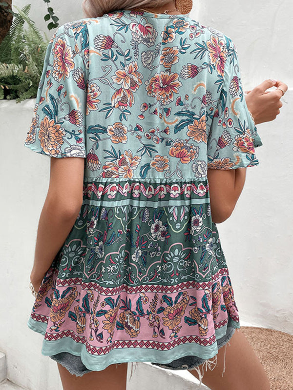 Back view of a Women's Bohemian Blouse highlighting the detailed floral print