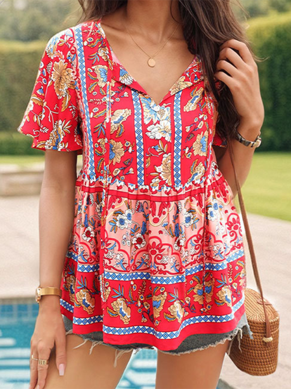 Vibrant floral Women's Bohemian Blouse paired with denim shorts