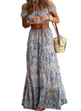 Woman wearing a bohemian paisley off-shoulder maxi dress, showcasing its flowy and elegant design.