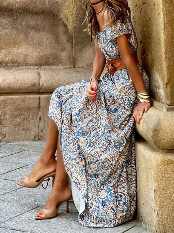 Boho style maxi dress with an off-shoulder design and intricate paisley pattern, perfect for casual gatherings.
