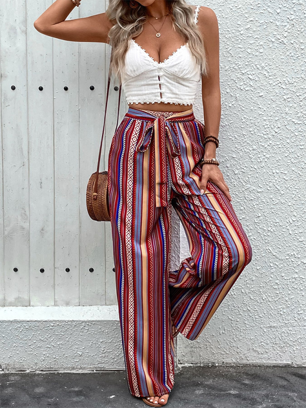 Comfortable high waist wide leg pants with bold, colorful stripes.