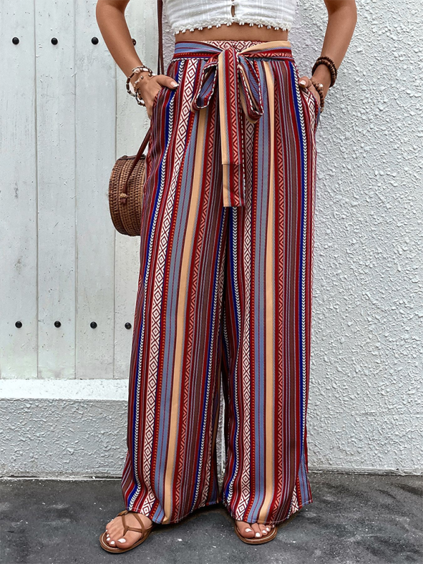High waist wide leg pants with vibrant stripes and adjustable waist tie.