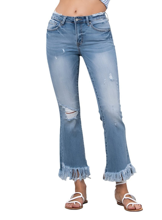 Front view of Insane Gene Mid-Rise Frayed Crop Flare Jeans with light distressing.