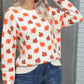 Ivory sweater with orange fall leaves, offering a cozy and stylish option for cool autumn weather.

