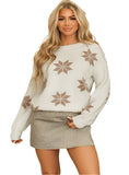 Front view of an ivory snowflake knit sweater, perfect for holiday gatherings and cozy winter days.

