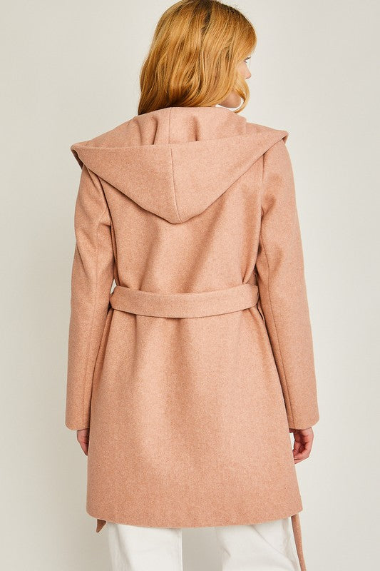 Back view of mauve fleece coat with hood and belted waist
