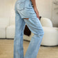 Side view of Judy Blue high waist distressed denim.