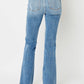 Back view of Judy Blue Raw Hem Bootcut Jeans highlighting the classic bootcut design.