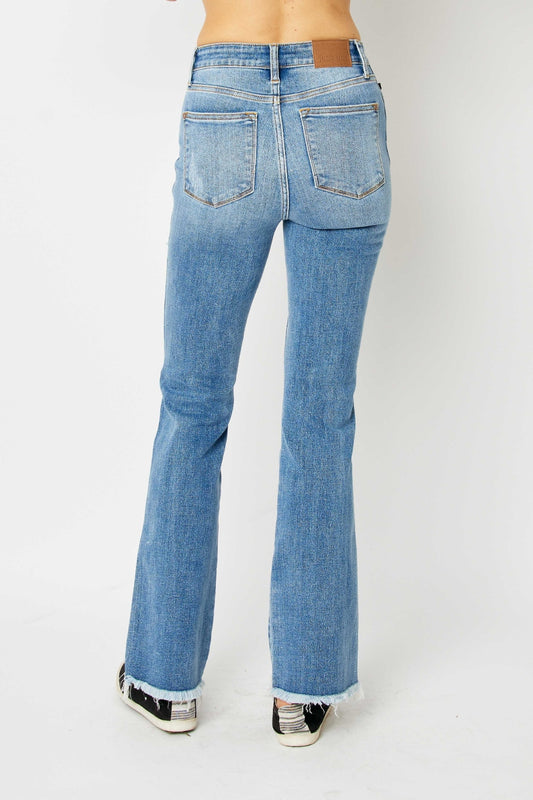 Back view of Judy Blue Raw Hem Bootcut Jeans highlighting the classic bootcut design.