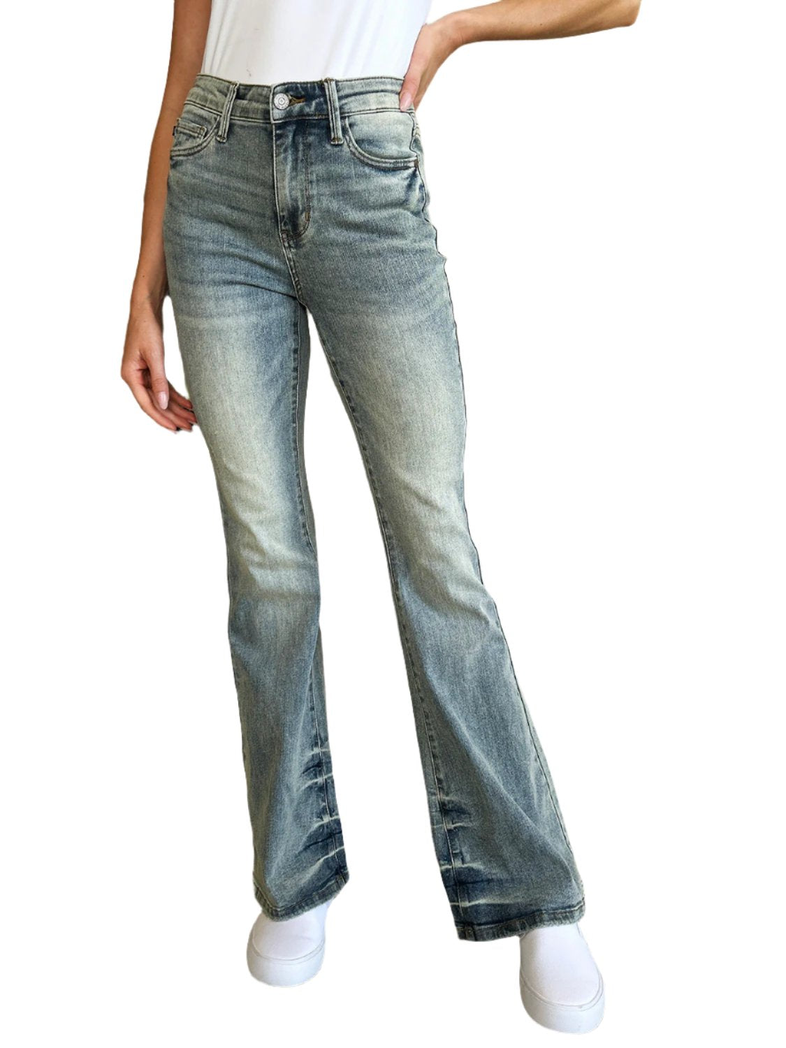 Mid-rise flare jeans in light wash with subtle fading.