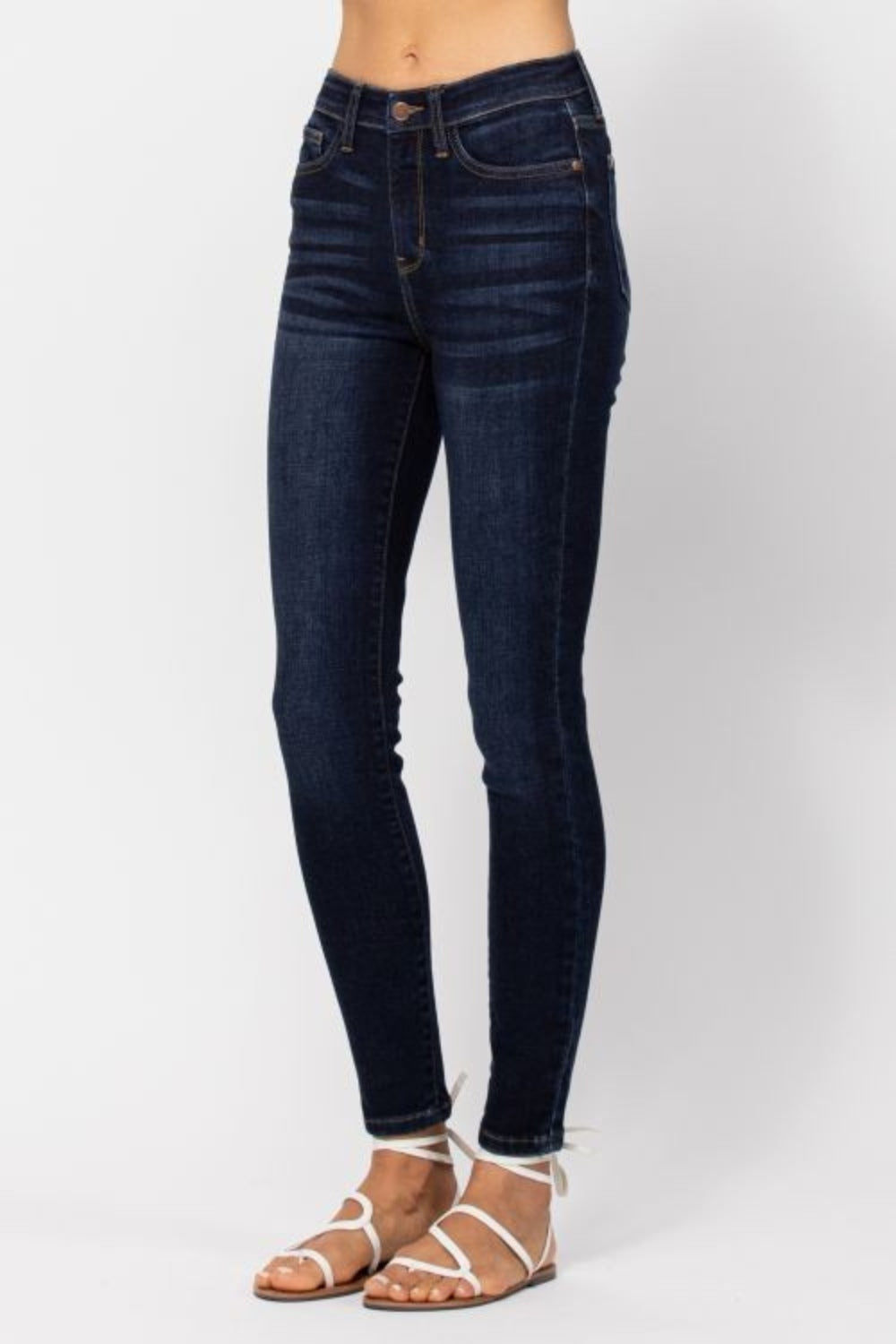 Dark wash high-rise skinny jeans by Judy Blue with a flattering fit.
