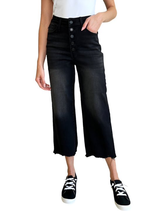 High waist button fly jeans with frayed hem detail.