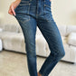 Close-up of Judy Blue High Waist Skinny Jeans showcasing dark wash and denim texture.