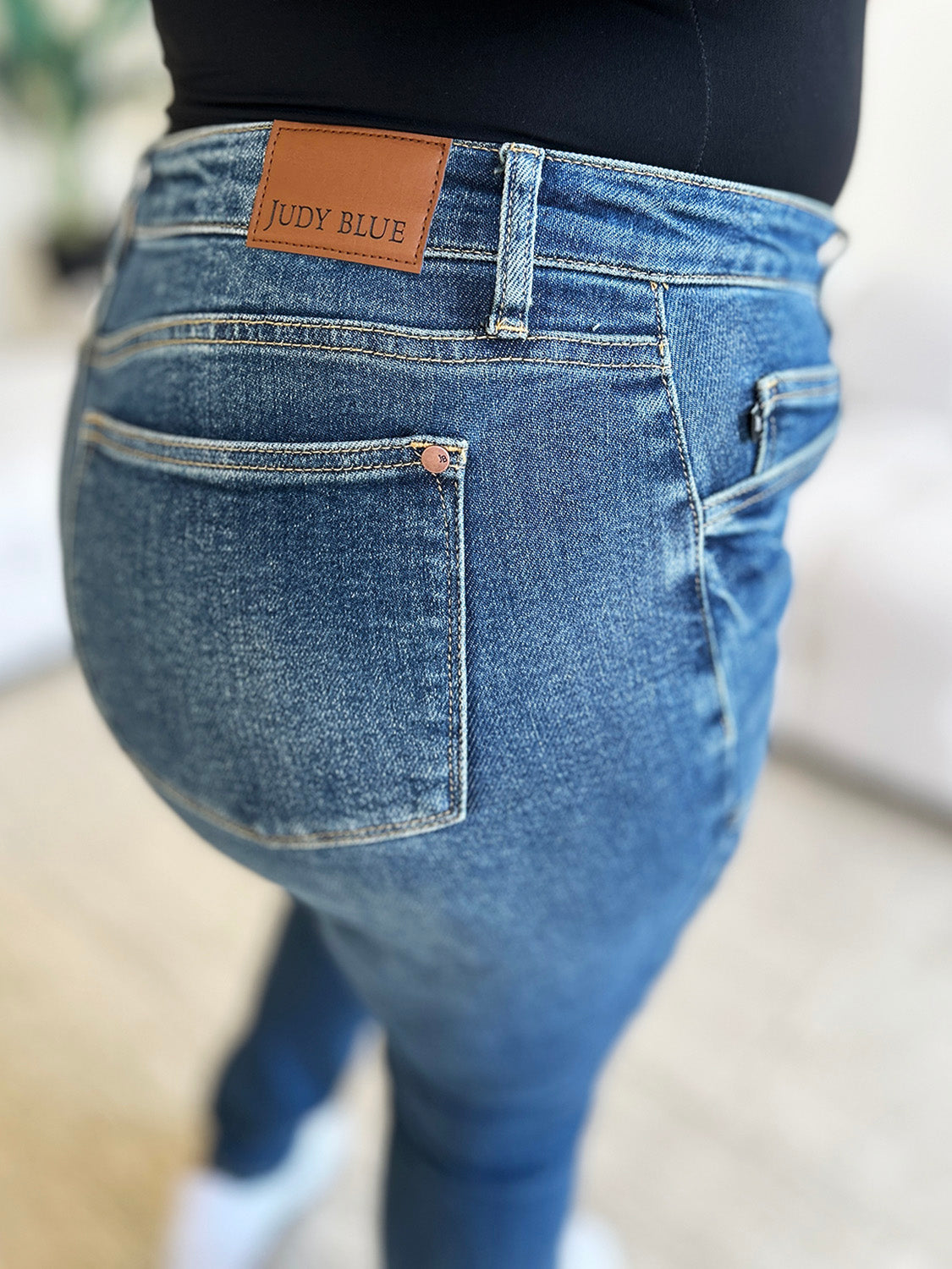 Close-up of Judy Blue High Waist Skinny Jeans showcasing dark wash and denim texture.