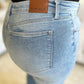 A close-up of the back of Judy Blue High Waist Wide Leg Jeans, highlighting the pockets and brand label.