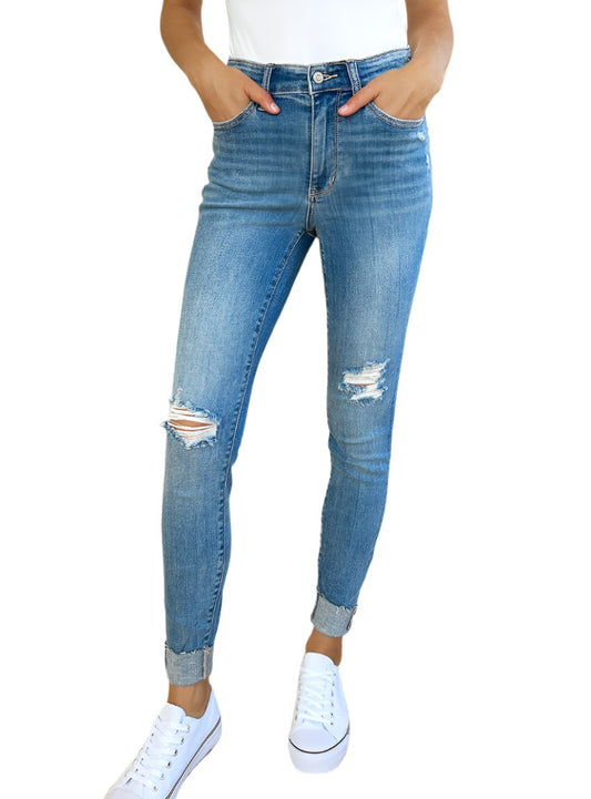 Front view of Judy Blue Mid Rise Destroy & Cuff Skinny Jeans showing distressed details and cuffed hem.