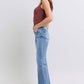 Side view of Judy Blue Raw Hem High Rise Bootcut Jeans highlighting the bootcut silhouette and raw hem detail.
