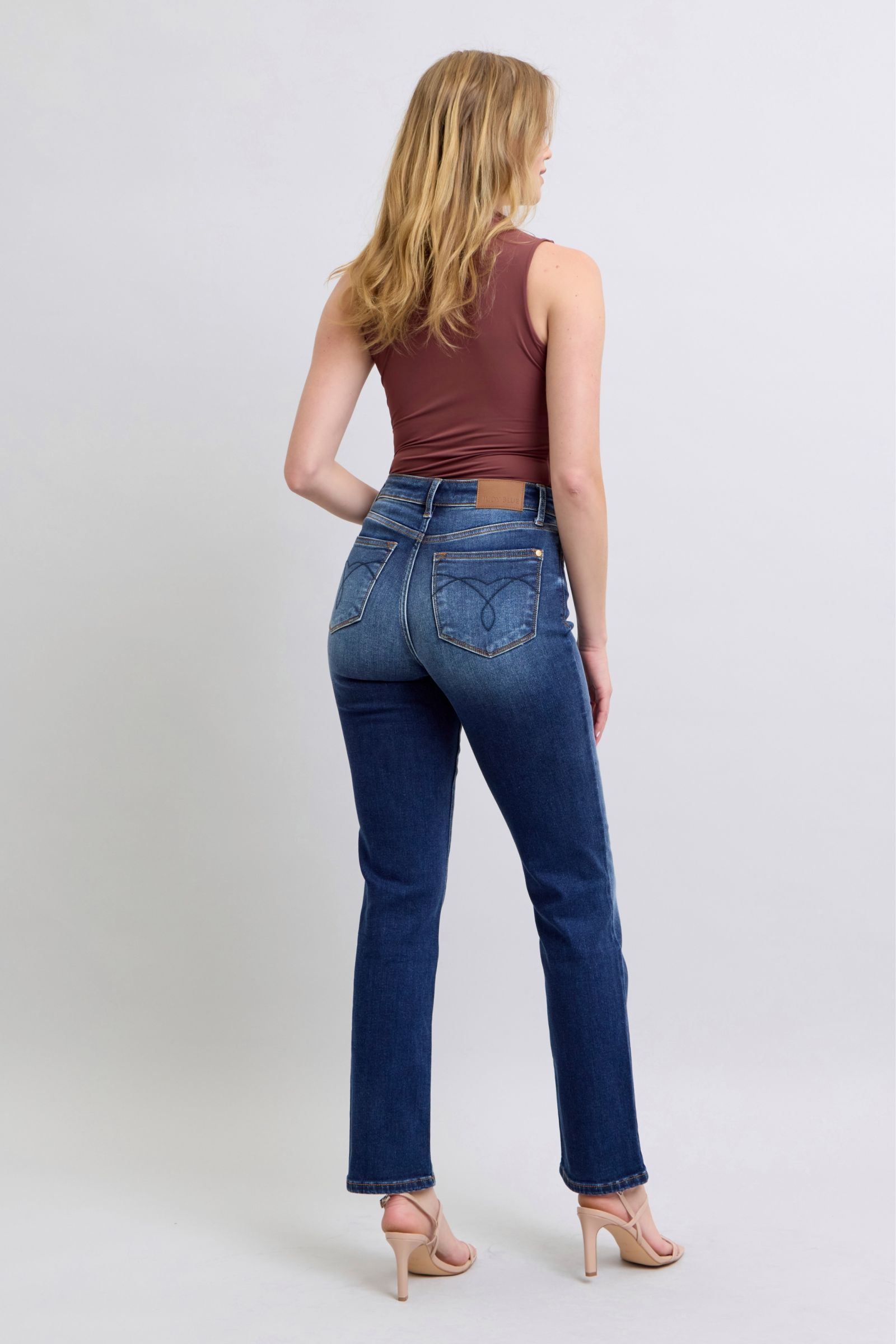 Full-length view of Judy Blue straight-leg jeans in dark wash for a classic and versatile appearance.
