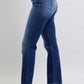 Pocket detail on Judy Blue washed straight-leg jeans showcasing practicality and style.
