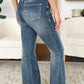 Medium wash high-rise jeans with tummy control and flare leg by Judy Blue.
