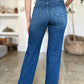 Back view of Judy Blue Tummy Control Straight Jeans highlighting pocket design and overall fit.