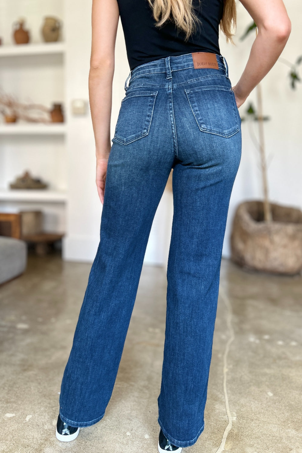 Back view of Judy Blue Tummy Control Straight Jeans highlighting pocket design and overall fit.