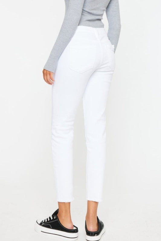 Kancan white ankle skinny jeans with mid-rise waist, front view.