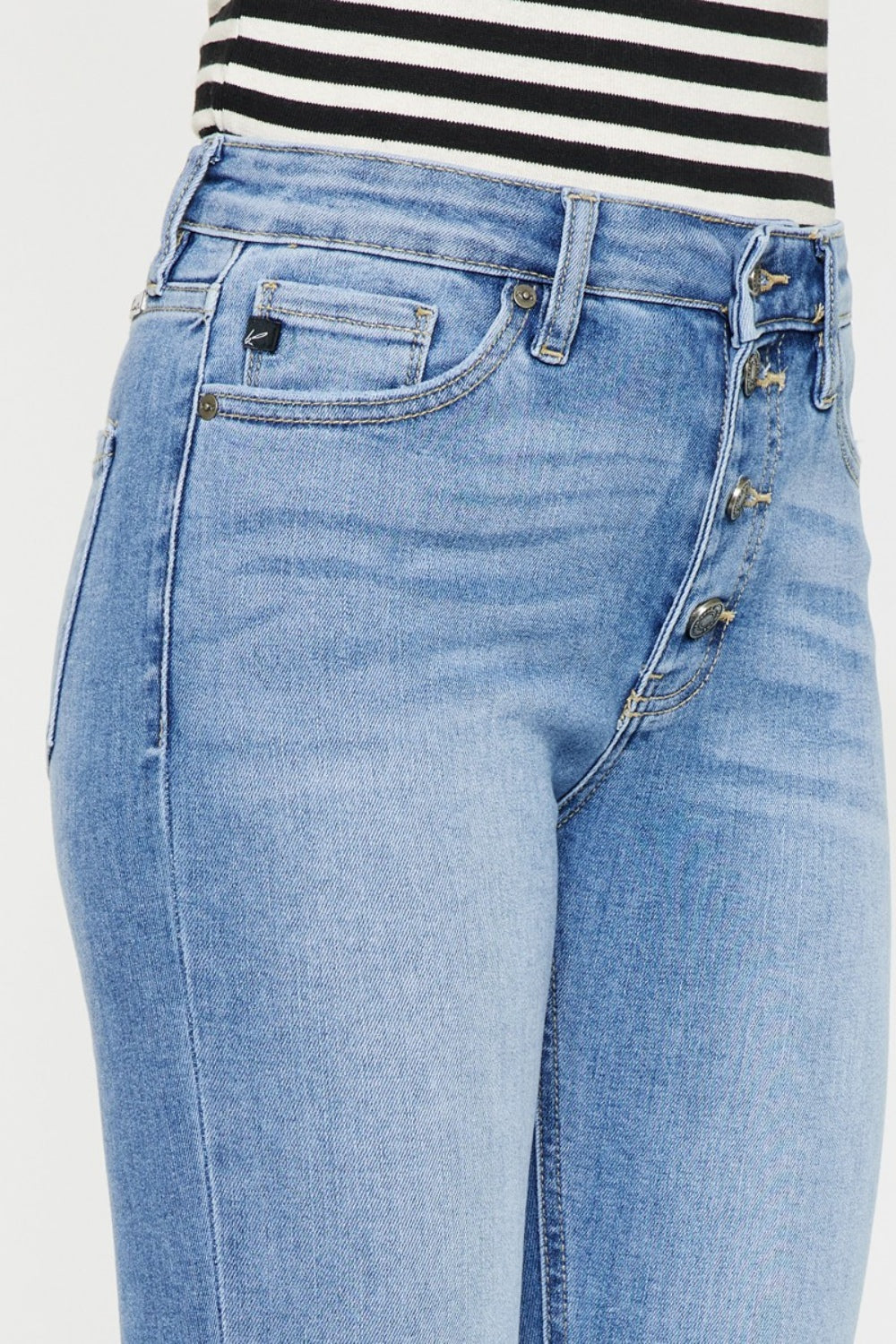 Close-up of button-fly closure on Kancan Cat's Whiskers Distressed Button Fly Jeans