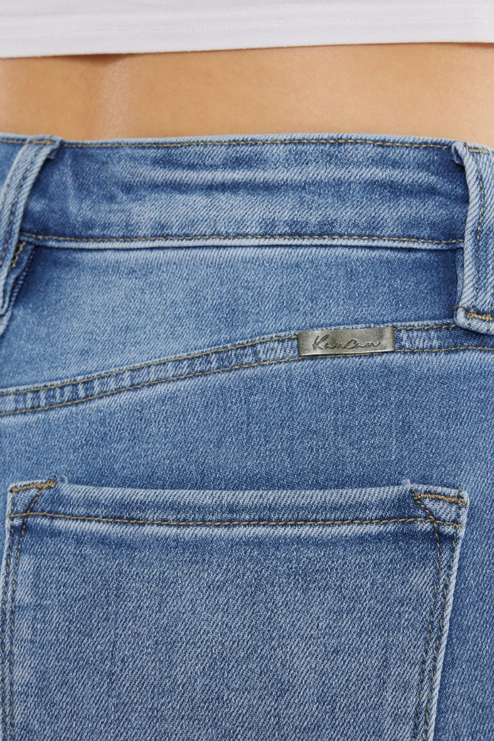 Close-up of Kancan Cat's Whiskers High Waist Jeans detailing the whiskering on the front.