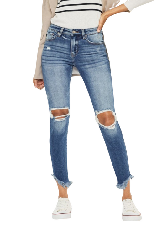 Kancan distressed raw hem ankle skinny jeans with a trendy and edgy design.