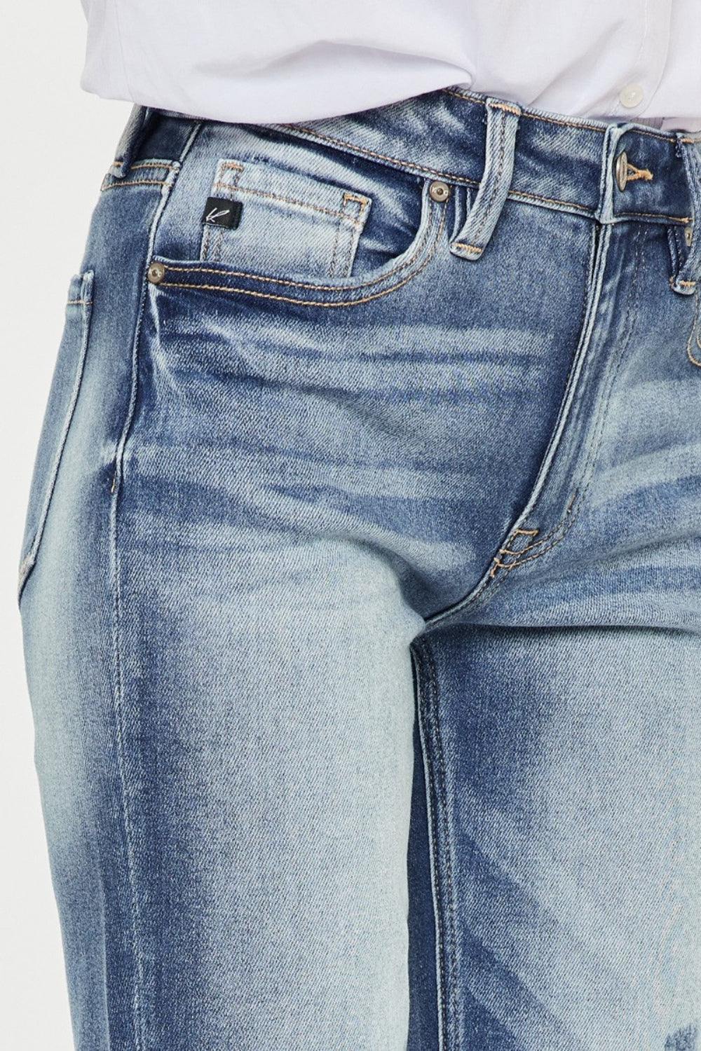 Closeup of Kancan High Rise Cuffed Straight Jeans' fabric, showing the premium denim quality.