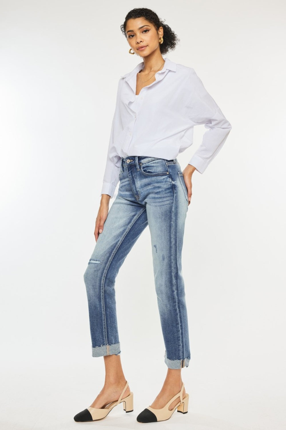 Cuffed hem detail on the Kancan High Rise Cuffed Straight Jeans for a casual yet chic look.