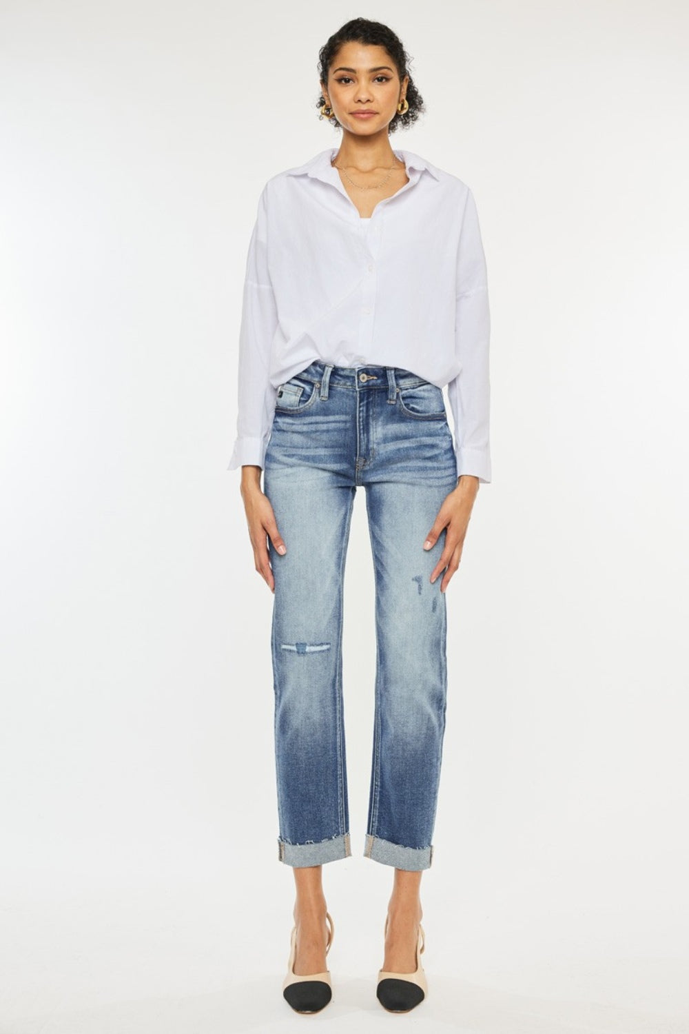 Kancan High Rise Cuffed Straight Jeans styled for versatility, perfect for both casual and dressy outfits.