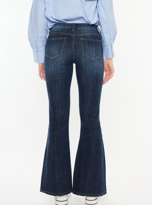 Back view of Kancan Mid Rise Flare Jeans showcasing pockets and flared hem.