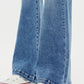 Close-up of Kancan wide leg jeans showcasing subtle stretch fabric.
