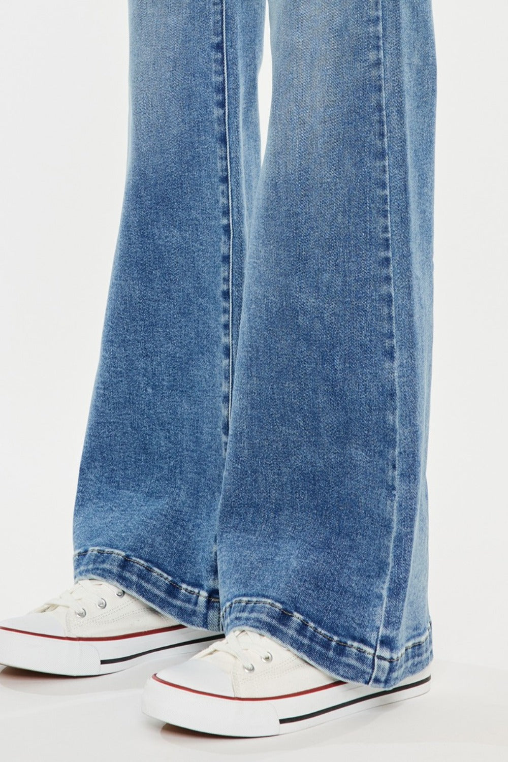 Close-up of Kancan wide leg jeans showcasing subtle stretch fabric.
