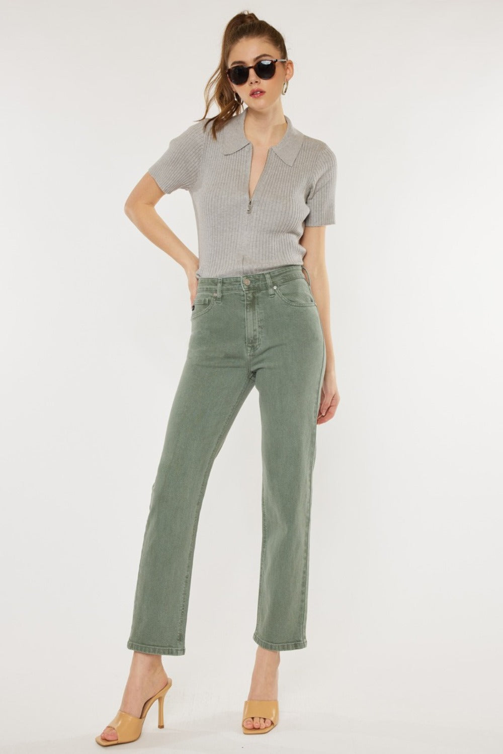 Olive-colored Kancan jeans with an ultra-high rise and straight leg fit.
