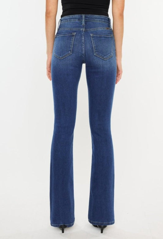 Women's high-rise slim bootcut jeans by Kancan in a deep blue denim shade.
