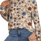 Front view of khaki allover floral print crew neck top with long sleeves.
