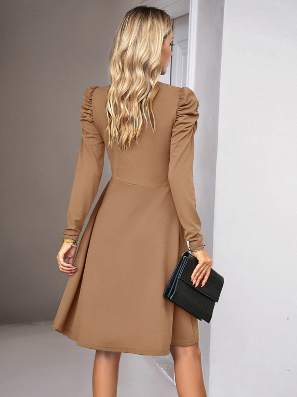 Elegant khaki solid color dress with a timeless design and flowing fit
