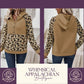 Trendy leopard print hoodie paired with dark skinny jeans for a casual look.