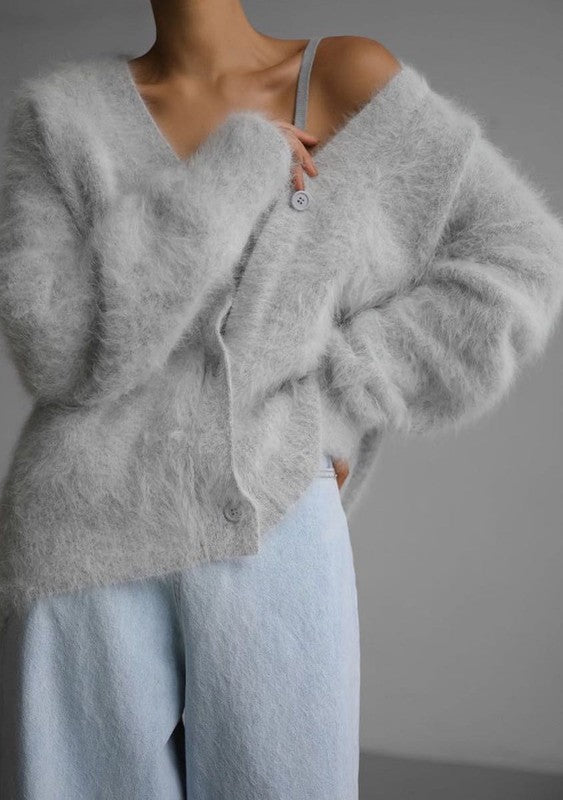 Light gray oversized button-front cardigan with a fuzzy texture
